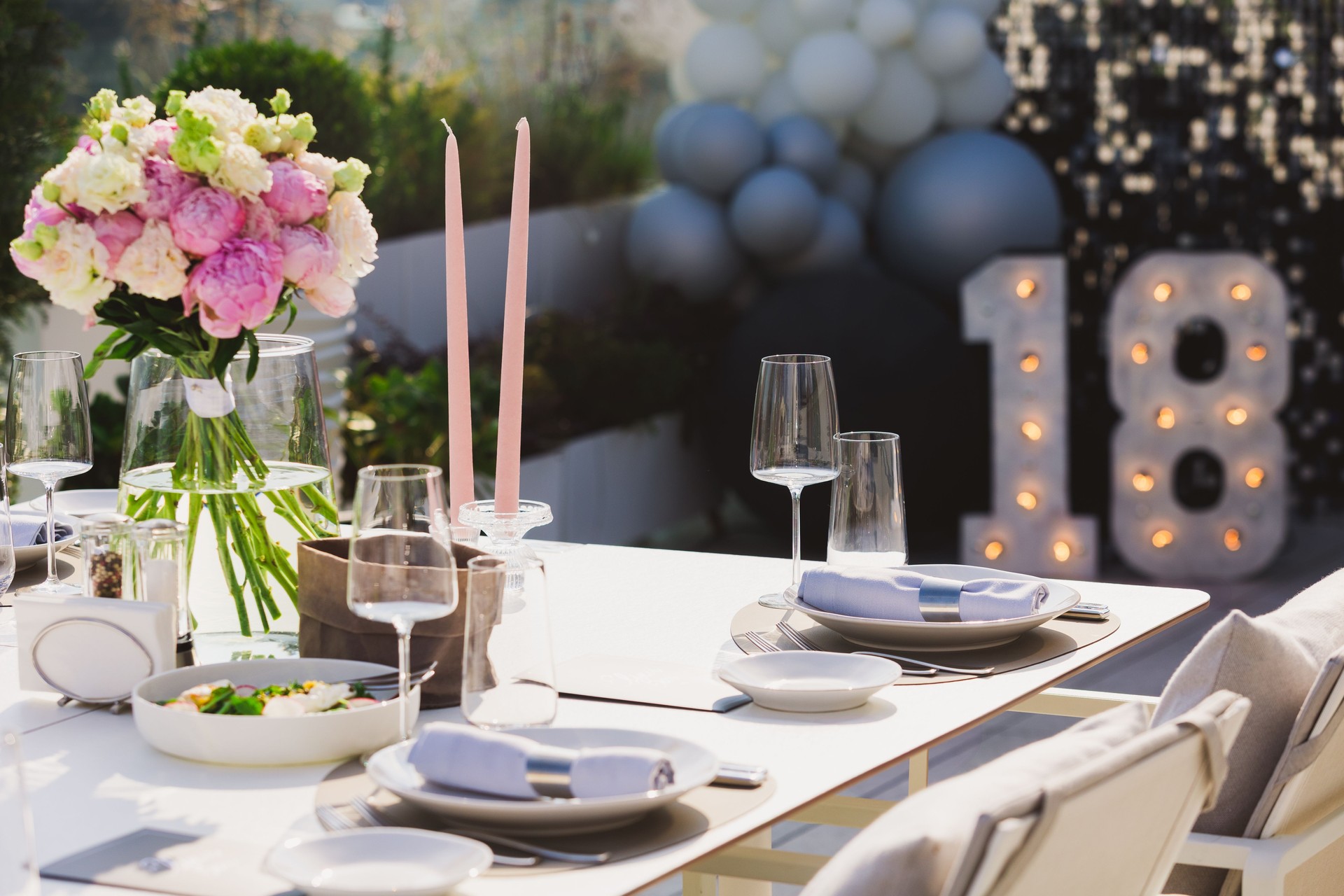 Stylish and sophisticated table setting at an 18th birthday party